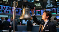 Trump rings Wall Street's opening bells as he ties his presidency to stock market gains